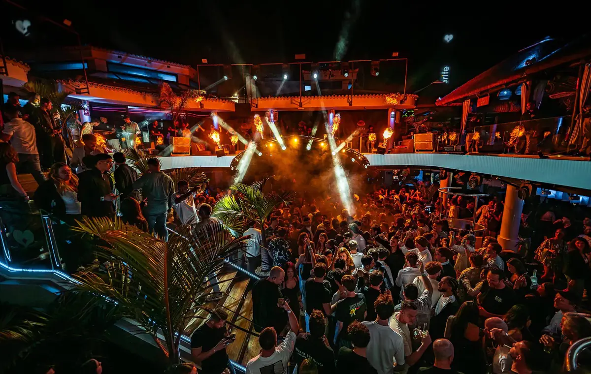 Crowd on the dance floor at Papagayo, Tenerife, under the lights